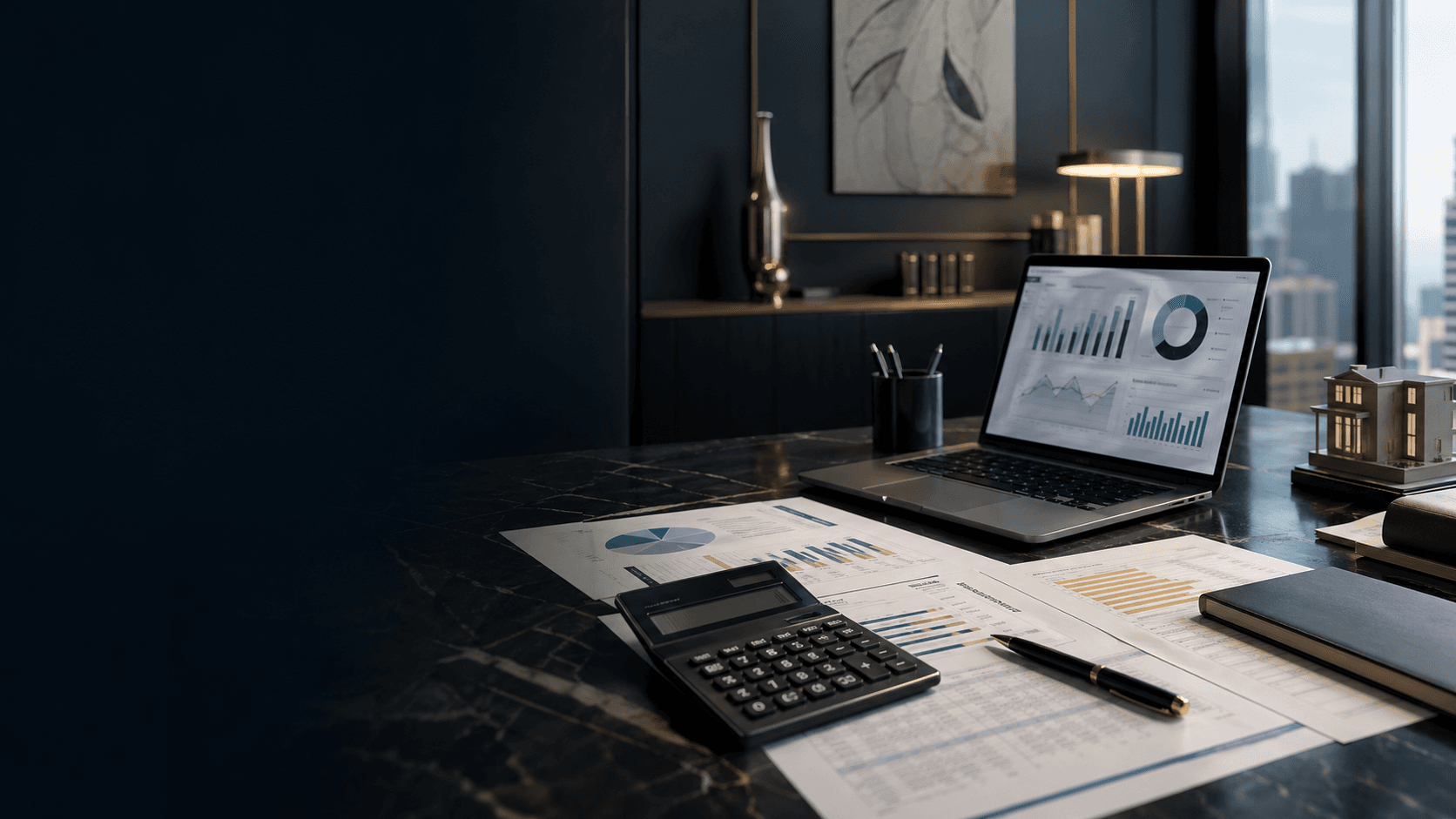 A home office desk with property financial documents, keys, and a calculator.